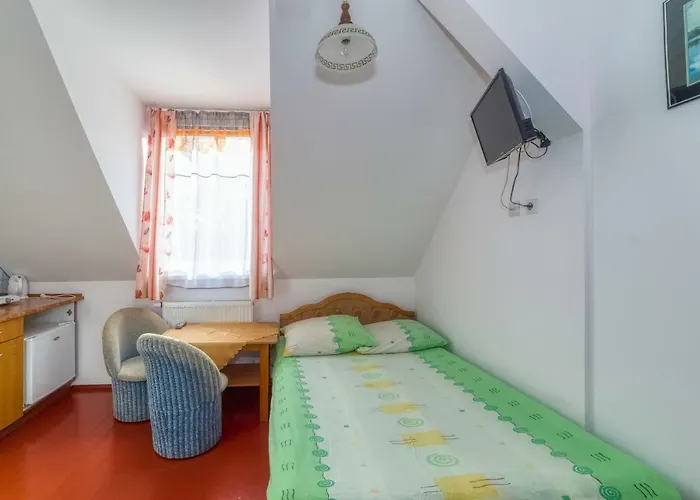 Quarto em Acomodações Particulares Zacisze Apartamenty,pokoje *